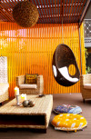 pavilion, orange paint, hanging char, feature wall, timber, contemporary garden, modern exterior 