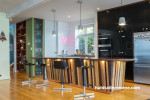 white kitchen, black fridge, white tiles, kitchen island, resene woodstock