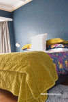 master bedroom, bedroom, blue bedroom, dark blue walls, deep blue, mustard throw 