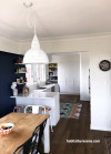 kitchen, dining room, white kitchen, blue dining, navy feature wall, resene biscay, blue and white